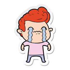 sticker of a cartoon man crying