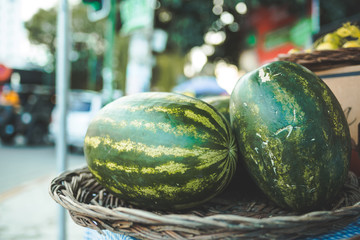 Two watermelons in a street market