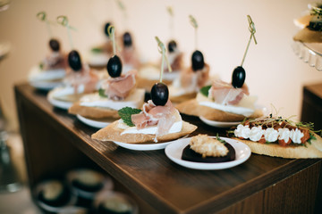 canape with cheese and olives