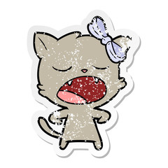 distressed sticker of a cartoon yawning cat