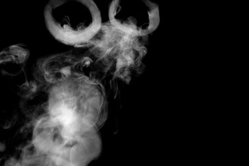 white circle smoke, abstract powder, water spray. isolated on black background.	