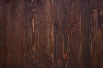 Vintage brown wooden back from tightly knocked boards