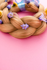 still life with make up products on pink