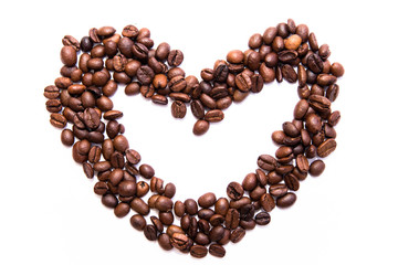 heart of coffee beans on white background