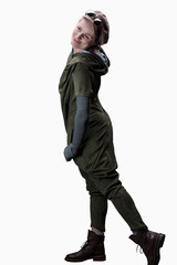 Young woman in a green jumpsuit in a cap and glasses posing in the studio isolated on a white background.