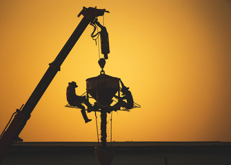 Obraz premium silhouette of a crane , Construction