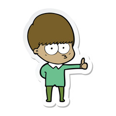 sticker of a curious cartoon boy giving thumbs up sign