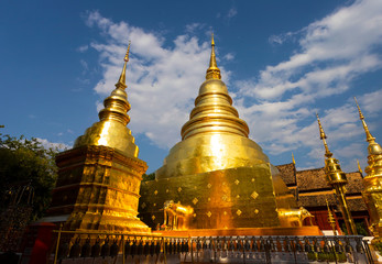 Naklejka premium CHIANGMAI, THAILAND - FEBRUARY 17, 2019 : Pagoda in Wat Phra Singh in Chiangmai, Thailand. Wat Phra Singh is the famous Buddhist temple in downtown of Chiangmai