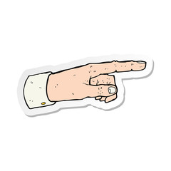 sticker of a cartoon pointing hand