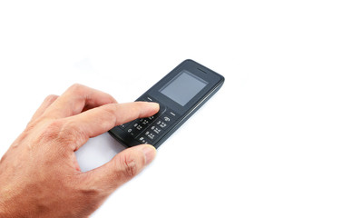 Hand pressing on Telephone / Old model mobile phone isolated on white background