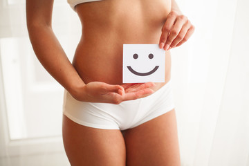 Women Health. Beautiful Female Body In Panties With Smile Card