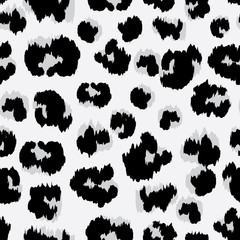 Vector of seamless pattern with faux leopard skin colored black and white. Animal repeat surface pattern. 