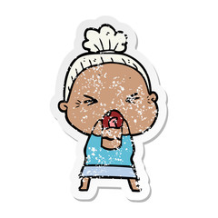 distressed sticker of a cartoon angry old woman