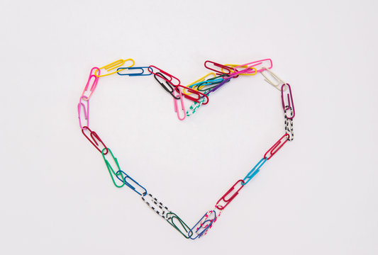 colorful paper clip on white background