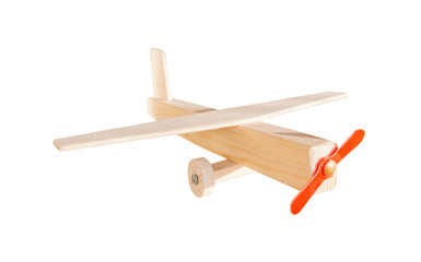 Wooden toy airplane isolated on white, as air transport concept