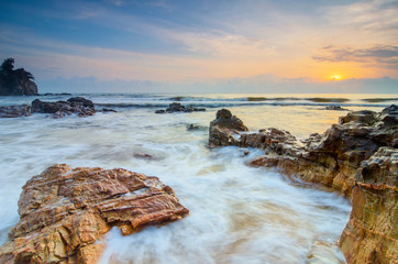 Travel And vacation concept background, beautiful tropical beach sunrise sea view. soft wave hitting sandy beach