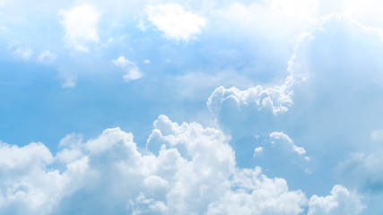 Blue sky and white clouds background.