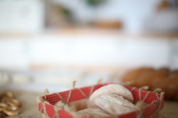 white cakes in a basket on the table