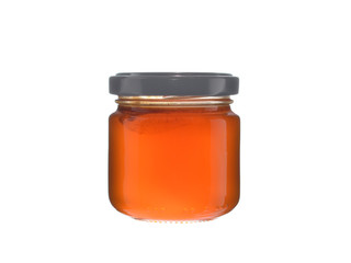 glass jar with jam closed by a cover on a white background