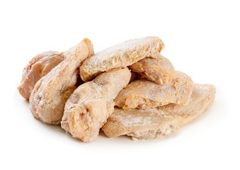 Raw chicken wings on a white background