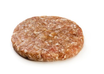 Raw meat cutlet on white background