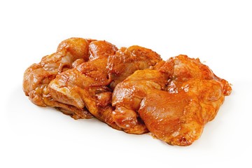 Raw chicken meat on a white background