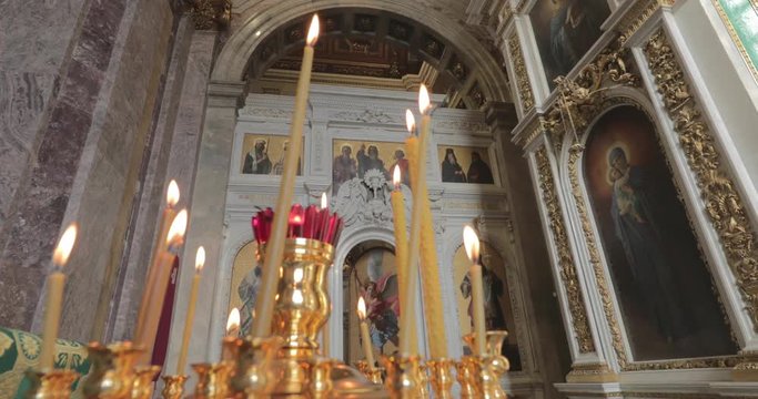 Interiors of Isaac cathedral, nobody, gold is everywhere, icons, sun, big window, museum, 4k video