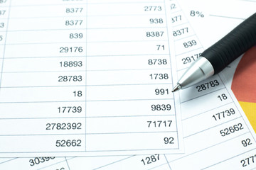 The pen on work table for  business content.