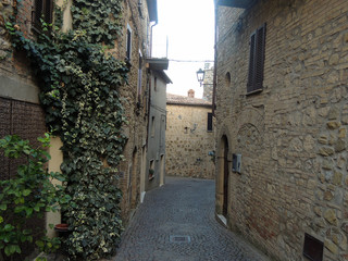Fototapeta na wymiar Medieval alley of Allerona (Umbria), one of the most beautiful villages in Italy. 