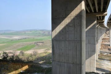 Symmetry. Architecture lines under the higway bridge.