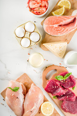 Animal protein sources - raw beef meat steak, chicken breast fillet, salmon fish, eggs, dairy milk, shrimps, cheese, copy space