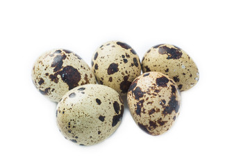 Quail eggs isolated on white. Selective focus