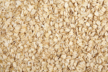 Oat-flakes texture background.