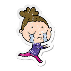 distressed sticker of a cartoon crying woman