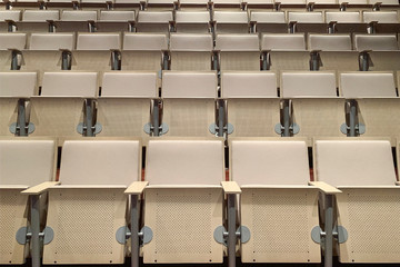 rows of seats in an empty theater
