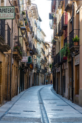 Atmospheric medieval street, Calle Mayor, Estella, Navarre region, Northern Spain