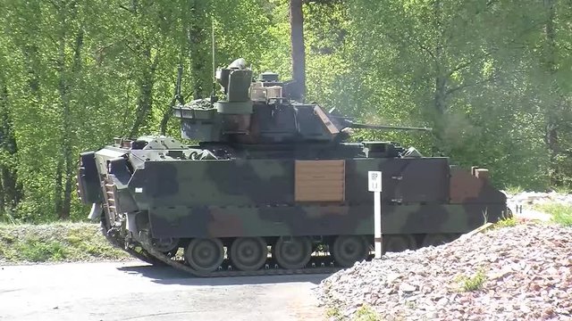 Bradley fighting vehicle firing main gun 4