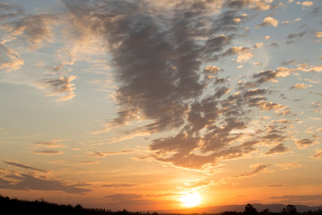 Sunset or sunrise overcast sky.