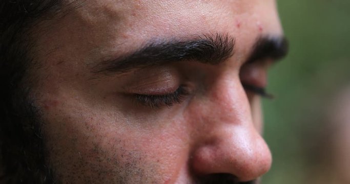 Close-up of man face meditating in nature