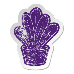 distressed old sticker of a green indoor plant