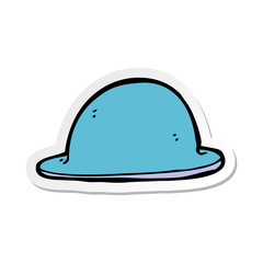 sticker of a cartoon red bowler hat