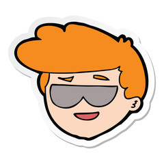 sticker of a cartoon boy wearing sunglasses