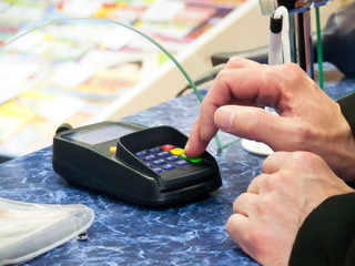 Hand dialing pin code on the terminal