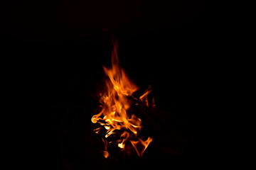 Fototapeta premium Fire flame isolated on black background