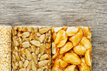 Assorted kozinaki, on the old vintage background. Country style