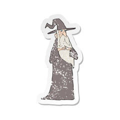 retro distressed sticker of a cartoon old wizard