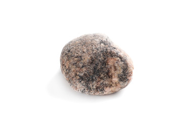 Rough round granite stone isolated on white background