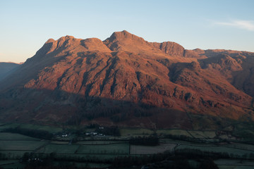 First light on the Langdale Pikes from Side Pike, Lake District, UK