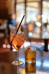 Two italian drinks: aperol spritz and crodino on the table