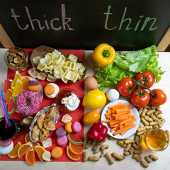 Concept toast and thin. Proper healthy food and sweet, harmful fast food. Plenty of food on the table. Top view